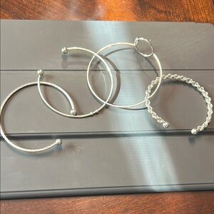 Set of 4 silver plated bracelets